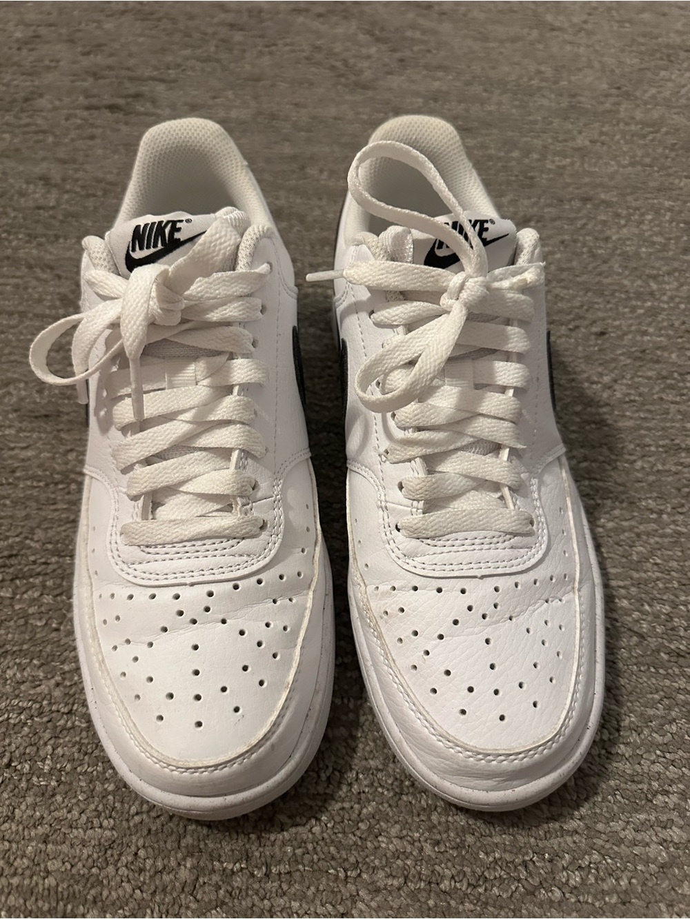 Nike White Low-Top Sneakers with Black Logos